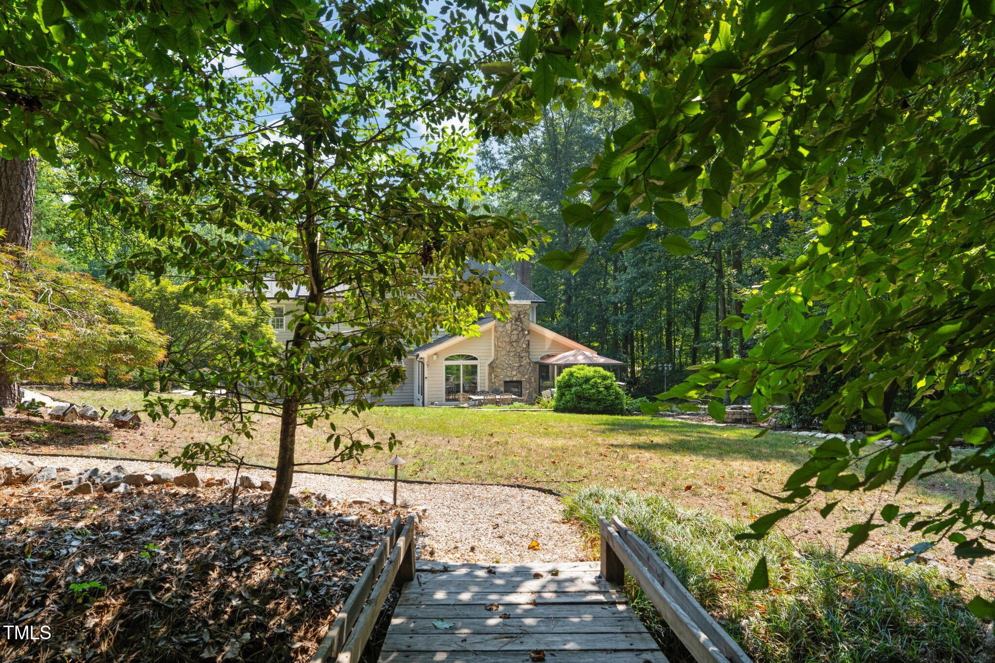 9009 Hometown Drive Raleigh, NC 27615 - Photo 63 of 82 a front view of a house with a yard