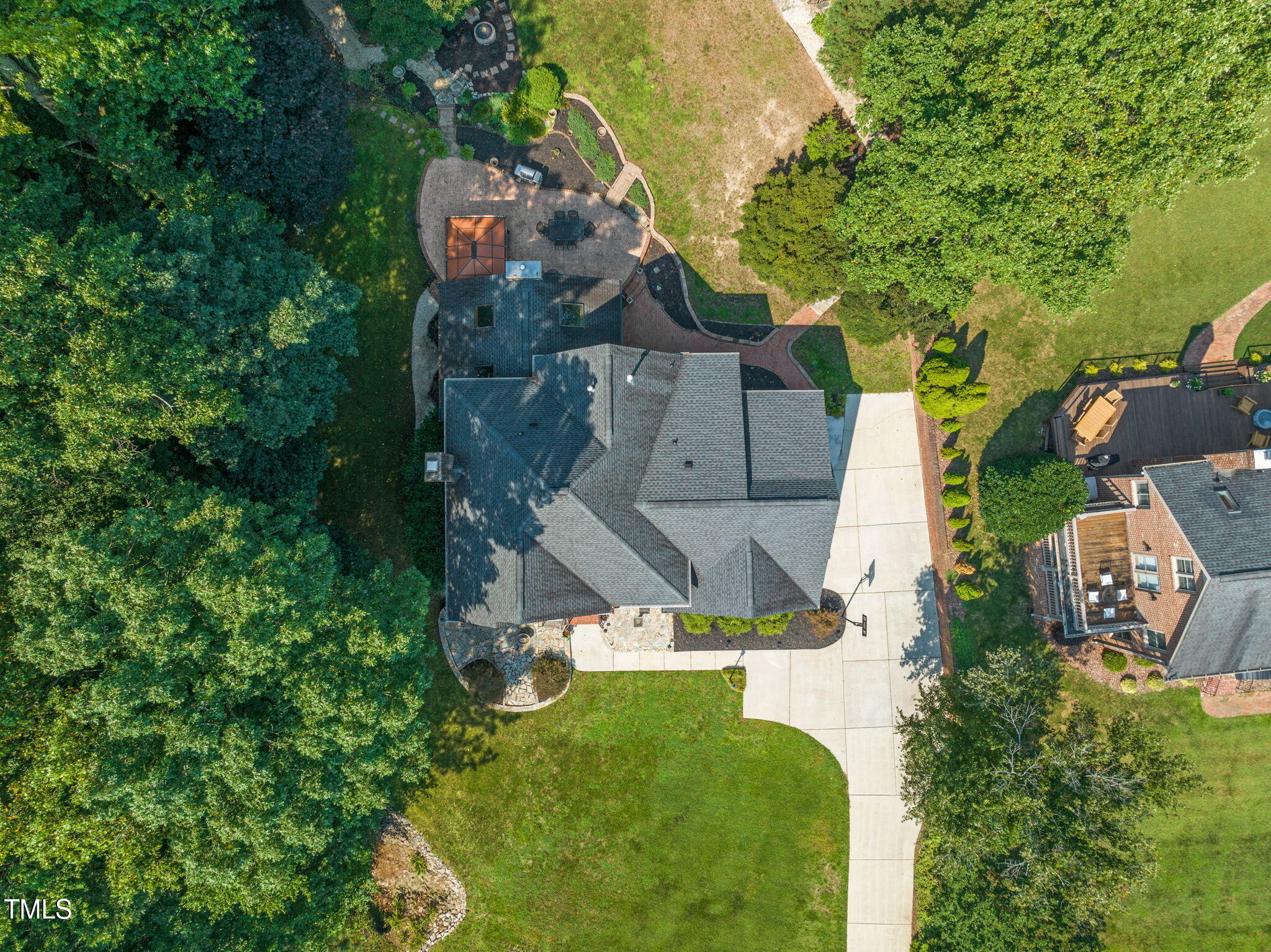 9009 Hometown Drive Raleigh, NC 27615 - Photo 68 of 82 an aerial view of a house with swimming pool a yard and mountain view in back