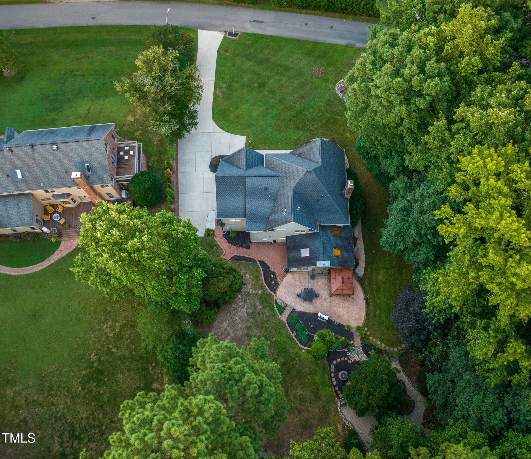 9009 Hometown Drive Raleigh, NC 27615 - Photo 81 of 82 an aerial view of a house with outdoor space swimming pool tennis courts and outdoor seating