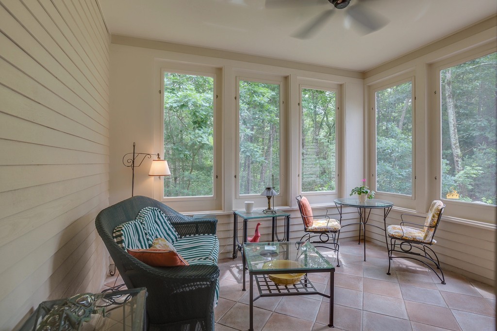 5 Emery Road, Unit 5 Bedford, MA 01730 - Photo 19 of 29 a living room with furniture and floor to ceiling windows
