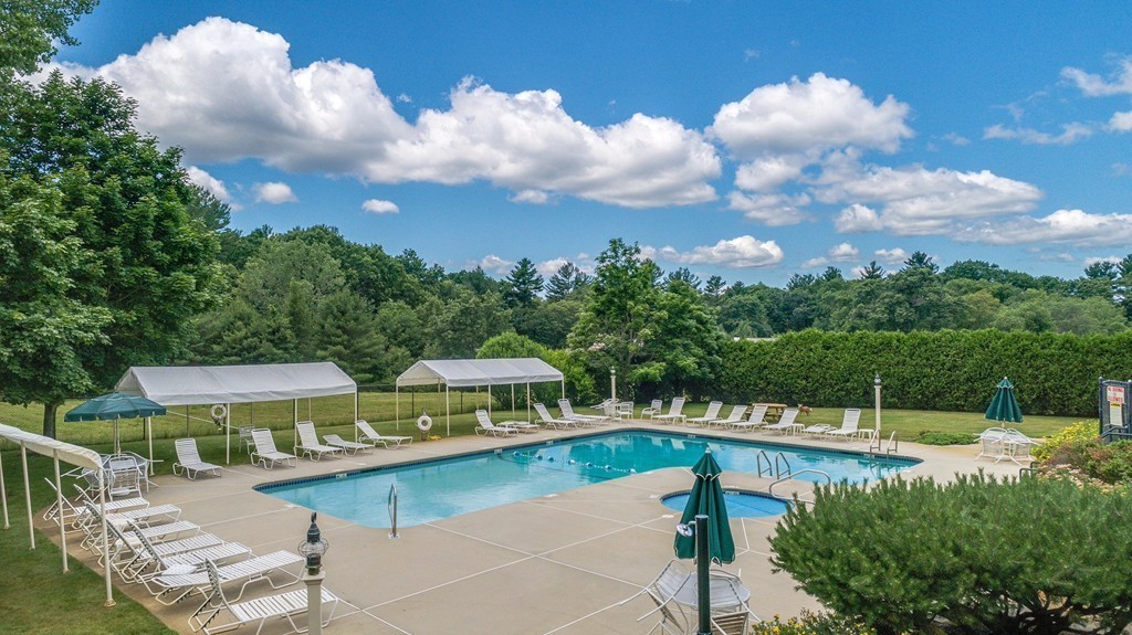 5 Emery Road, Unit 5 Bedford, MA 01730 - Photo 24 of 29 a view of a swimming pool from a balcony
