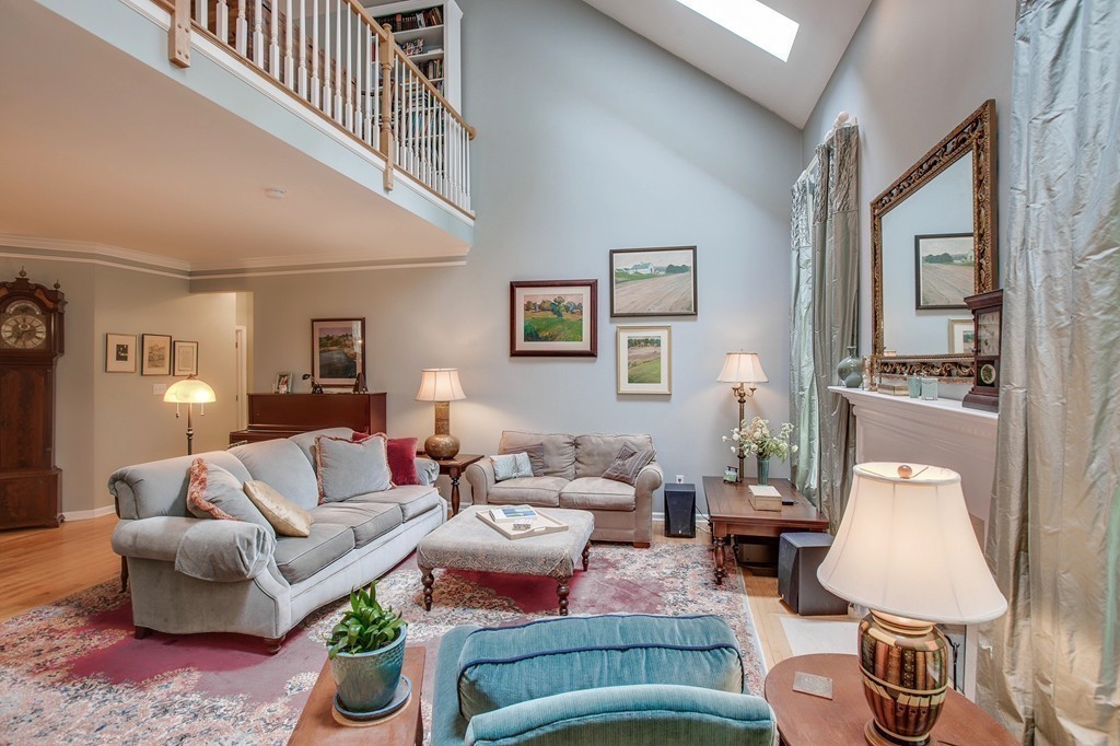 5 Emery Road, Unit 5 Bedford, MA 01730 - Photo 10 of 29 a living room with furniture and wooden floor