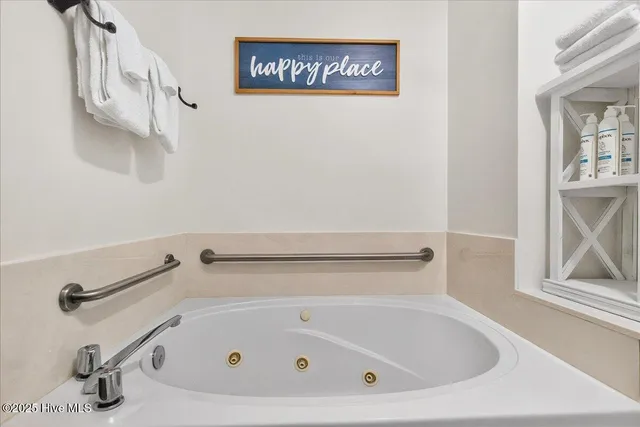 $200,000 | 908 Resort Circle, Unit 203, Sunset Beach, NC 28468