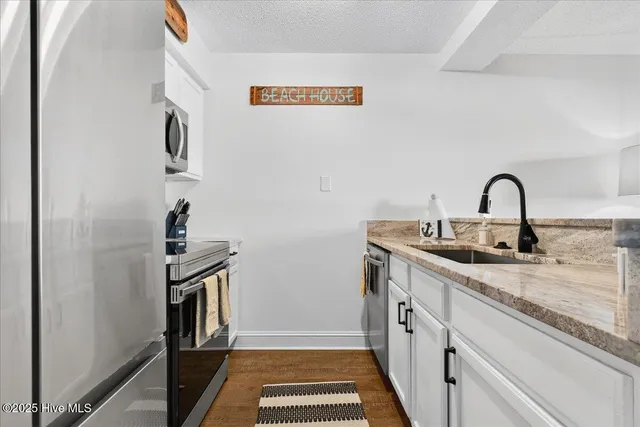 $200,000 | 908 Resort Circle, Unit 203, Sunset Beach, NC 28468