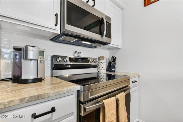 $200,000 | 908 Resort Circle, Unit 203, Sunset Beach, NC 28468