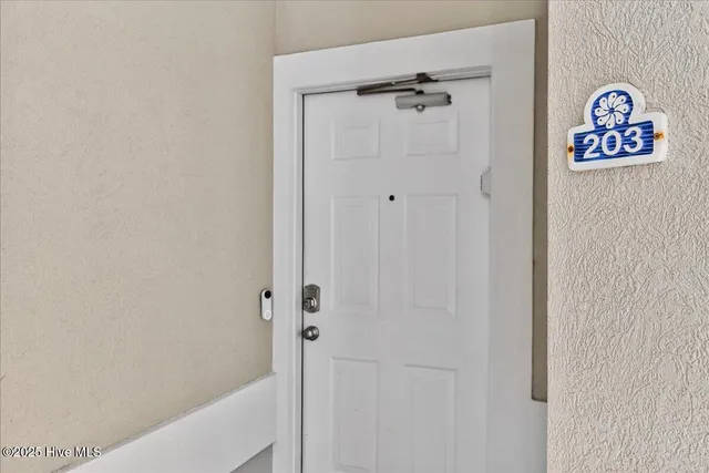 $200,000 | 908 Resort Circle, Unit 203, Sunset Beach, NC 28468