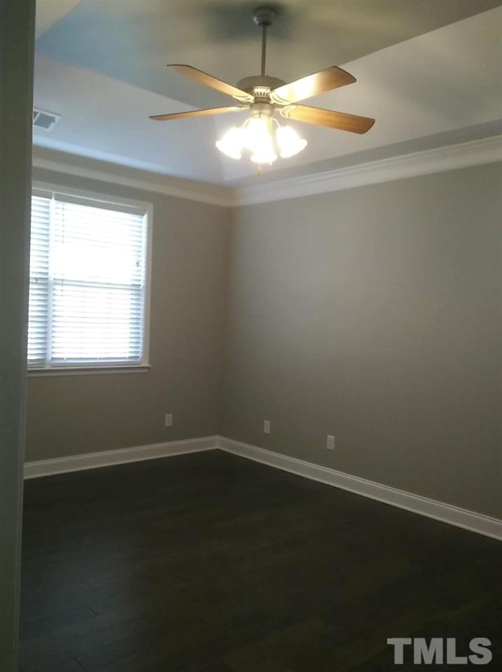 1229 Rutledge Landing Drive Knightdale, NC 27545 - Photo 13 of 15 a view of room with hardwood floor and window