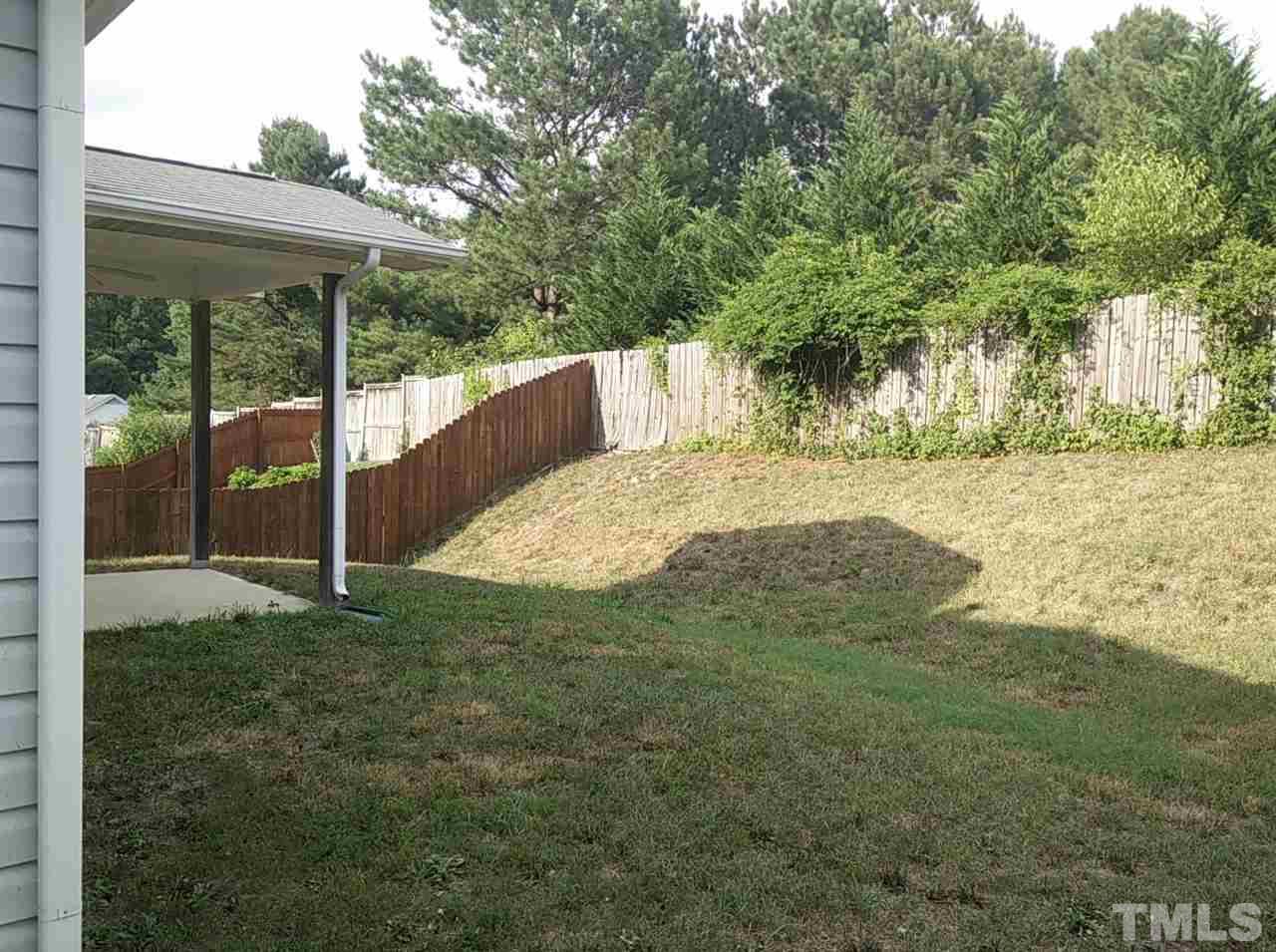 1229 Rutledge Landing Drive Knightdale, NC 27545 - Photo 15 of 15 a view of a yard with an outdoor space