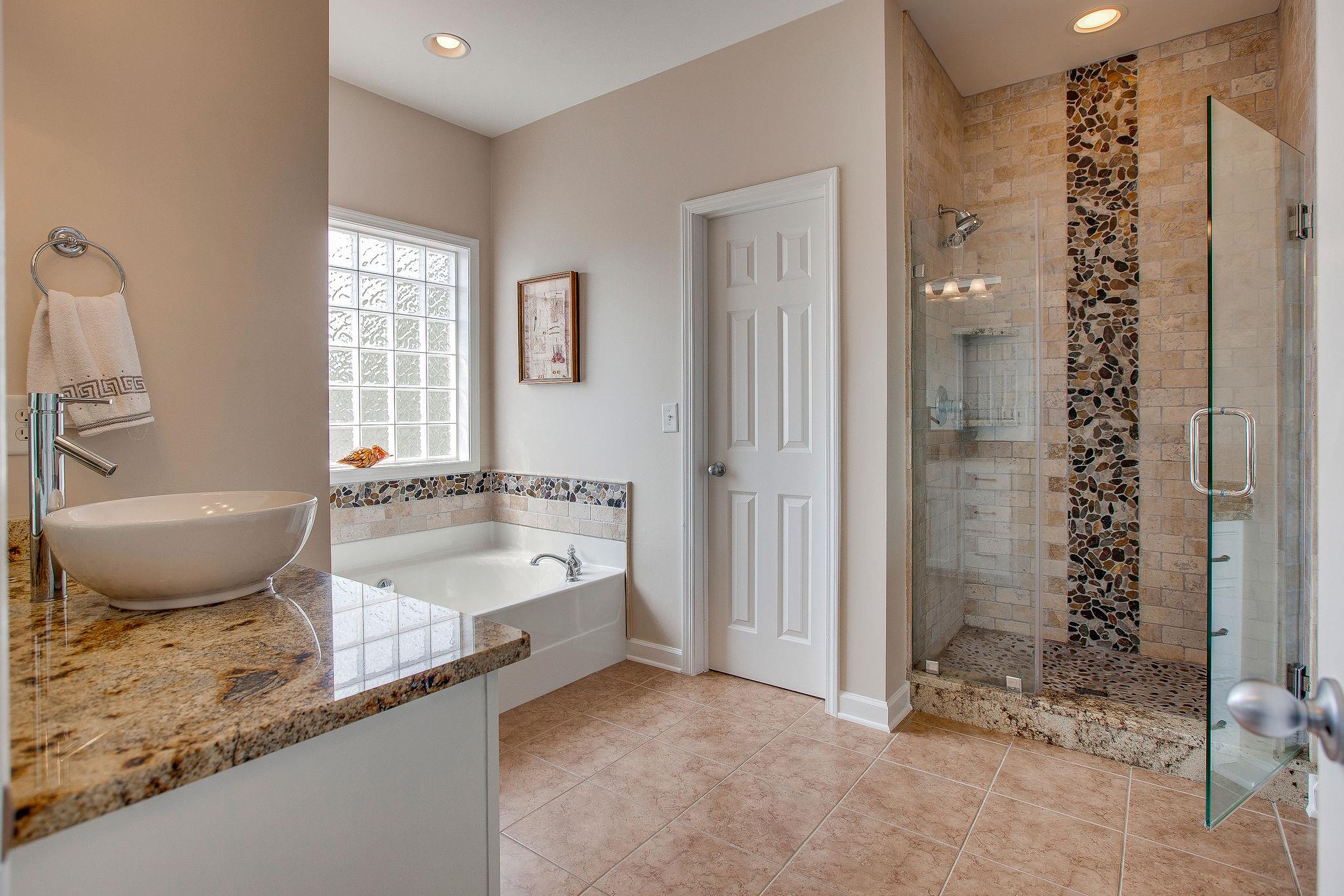 1017 Red Pepper Ridge Spring Hill, TN 37174 - Photo 18 of 27 Master bath with custom counter tops and custom tile shower.