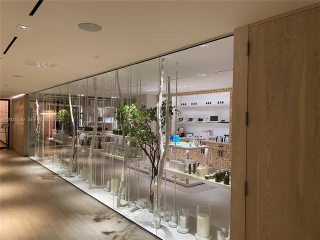 a room with lots of flower plants