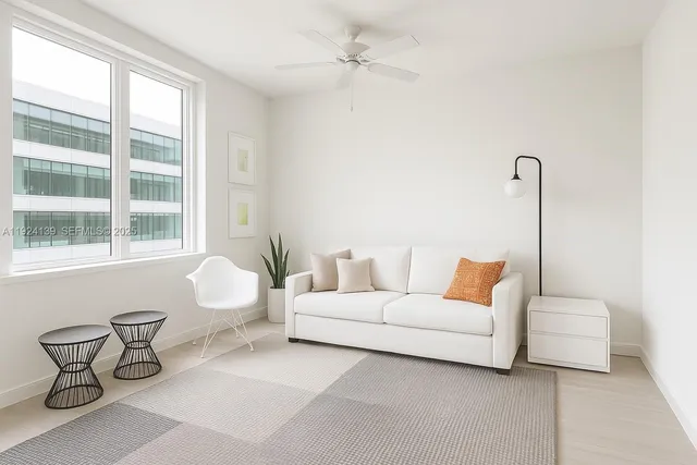 a living room with furniture and windows