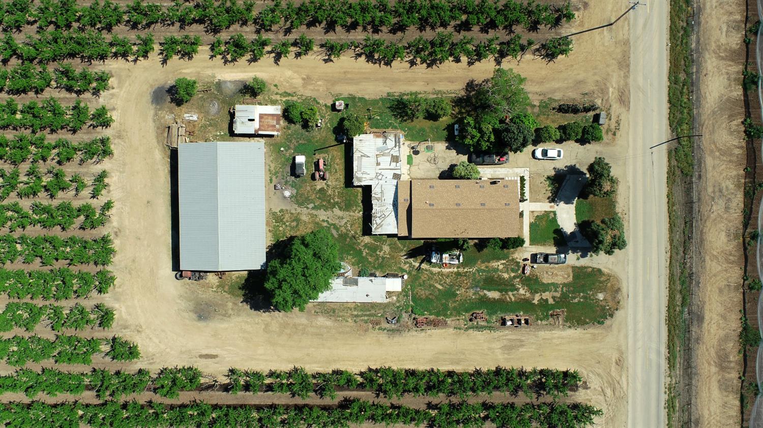 20532 East Parlier Avenue Reedley, CA 93654 - Photo 8 of 9 an aerial view of residential houses with outdoor space