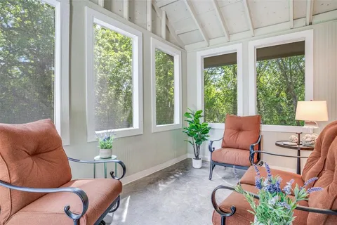 a outdoor living space with furniture and a potted plant
