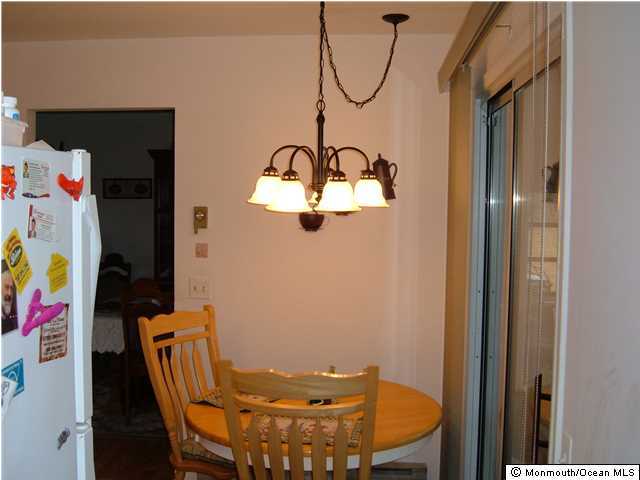 12 Stonybrook Road Whiting, NJ 08759 - Photo 15 of 25 a view of a dining area with furniture