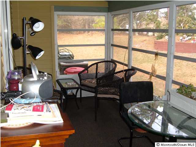 12 Stonybrook Road Whiting, NJ 08759 - Photo 18 of 25 a living room with furniture and a window
