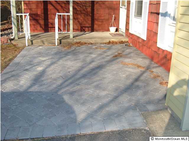 12 Stonybrook Road Whiting, NJ 08759 - Photo 5 of 25 a view of backyard with large windows