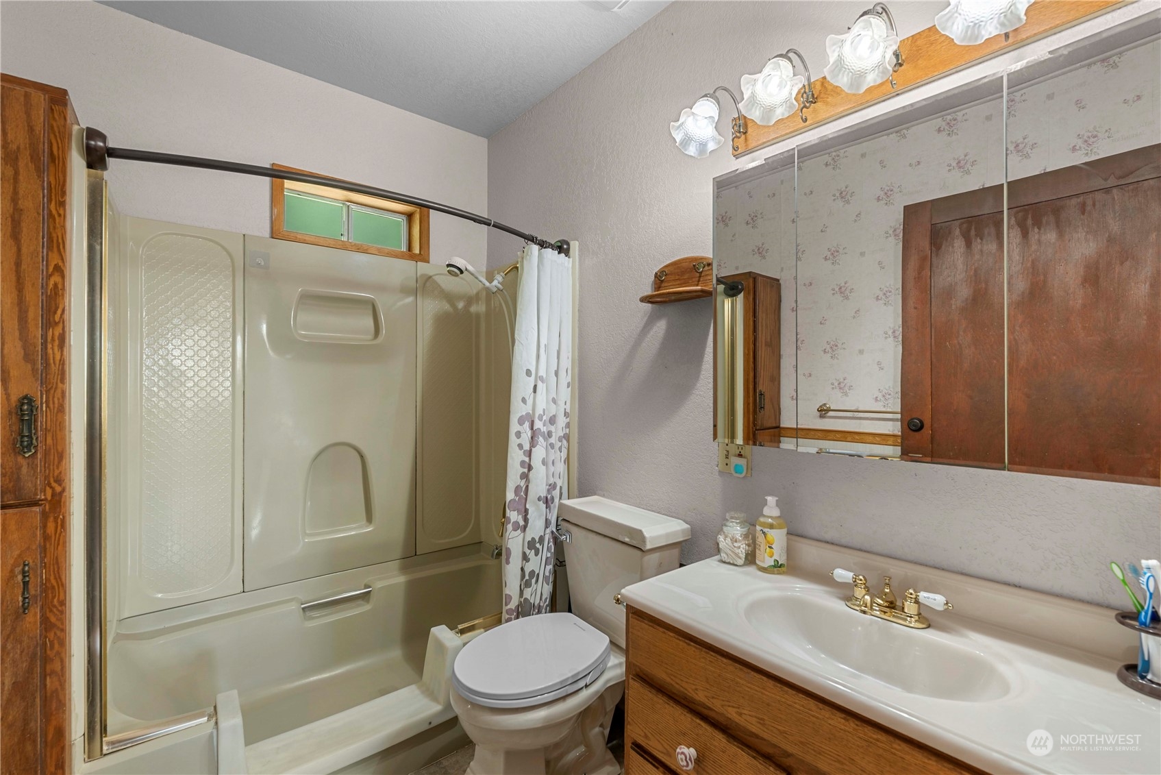 3327 Crestview Road Wenatchee, WA 98801 - Photo 11 of 39 a bathroom with a sink toilet and shower