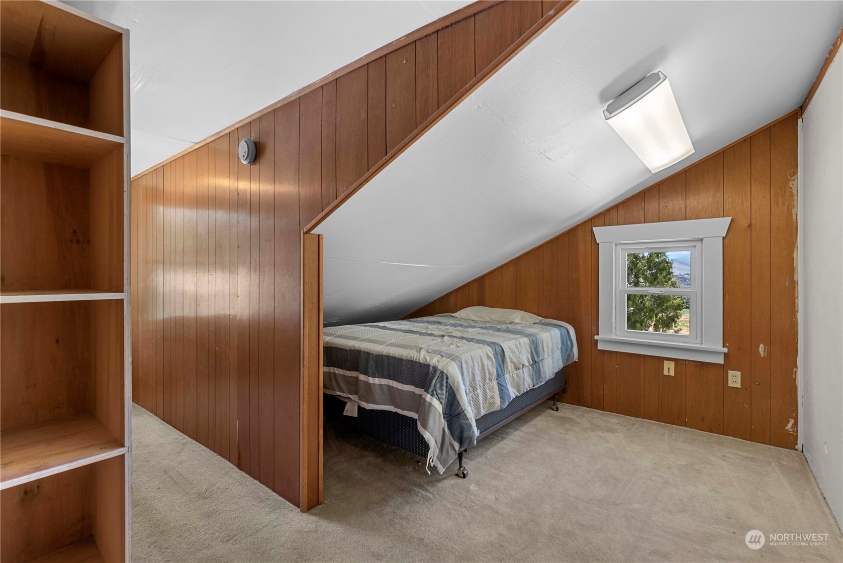 3327 Crestview Road Wenatchee, WA 98801 - Photo 14 of 39 a bedroom with a bed and a window