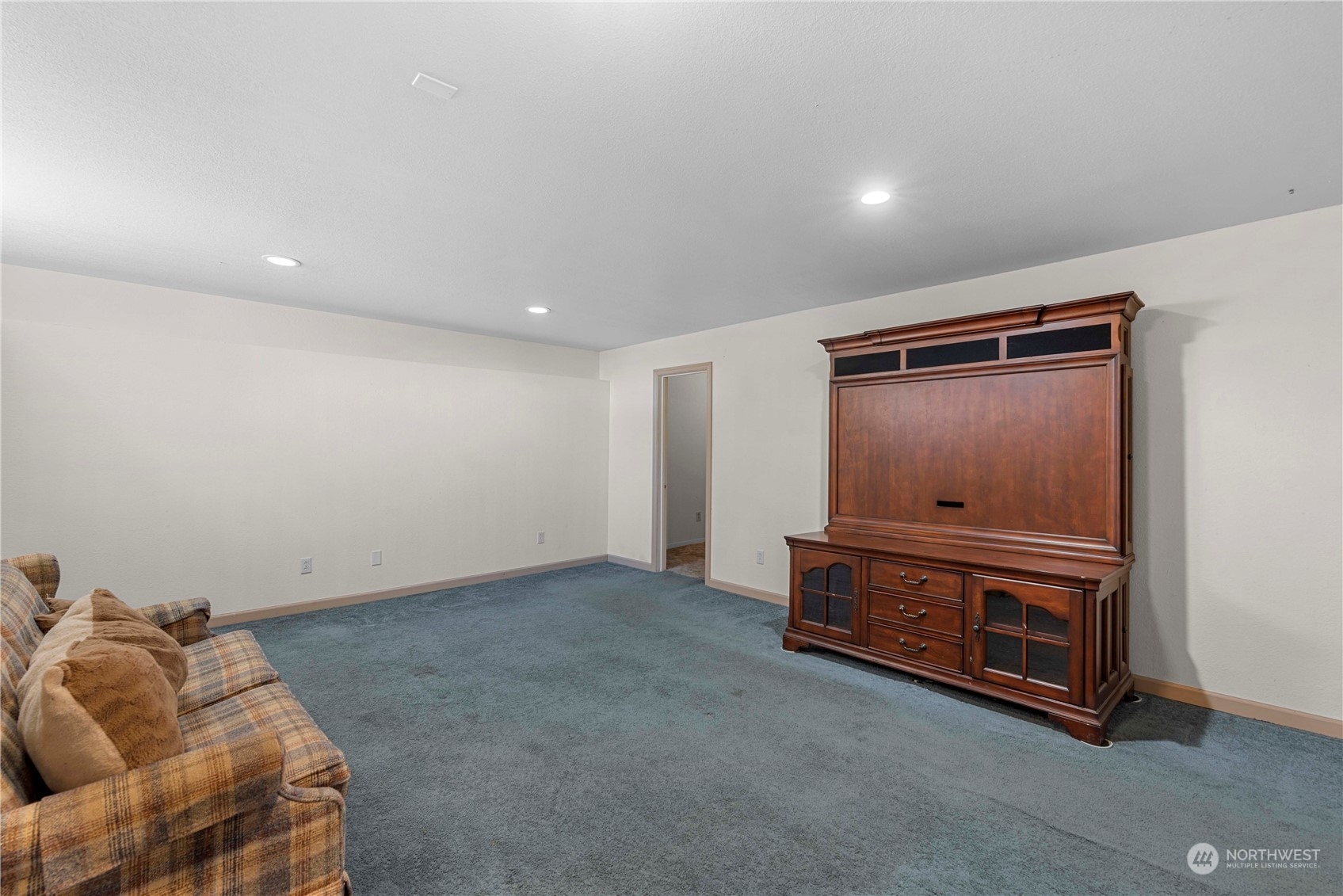 3327 Crestview Road Wenatchee, WA 98801 - Photo 30 of 39 a room with furniture and a wooden floor