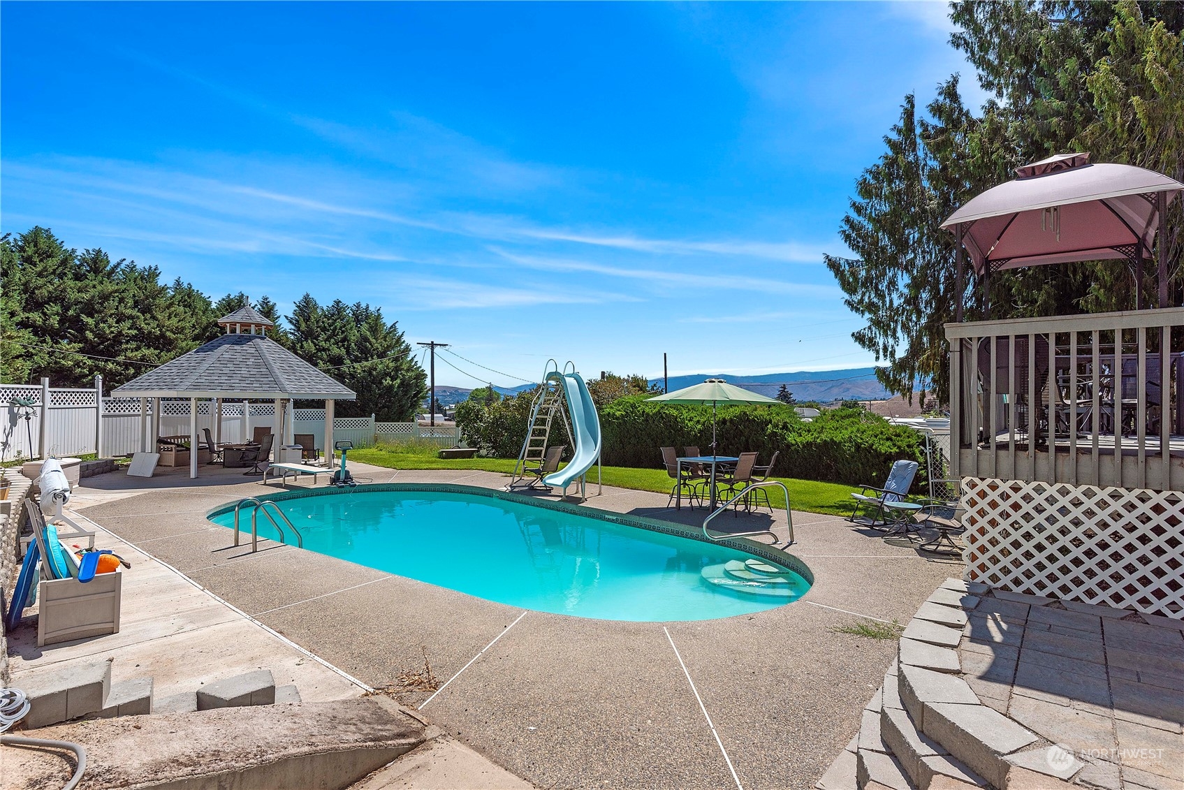 3327 Crestview Road Wenatchee, WA 98801 - Photo 32 of 39 an outdoor view of a house with swimming pool