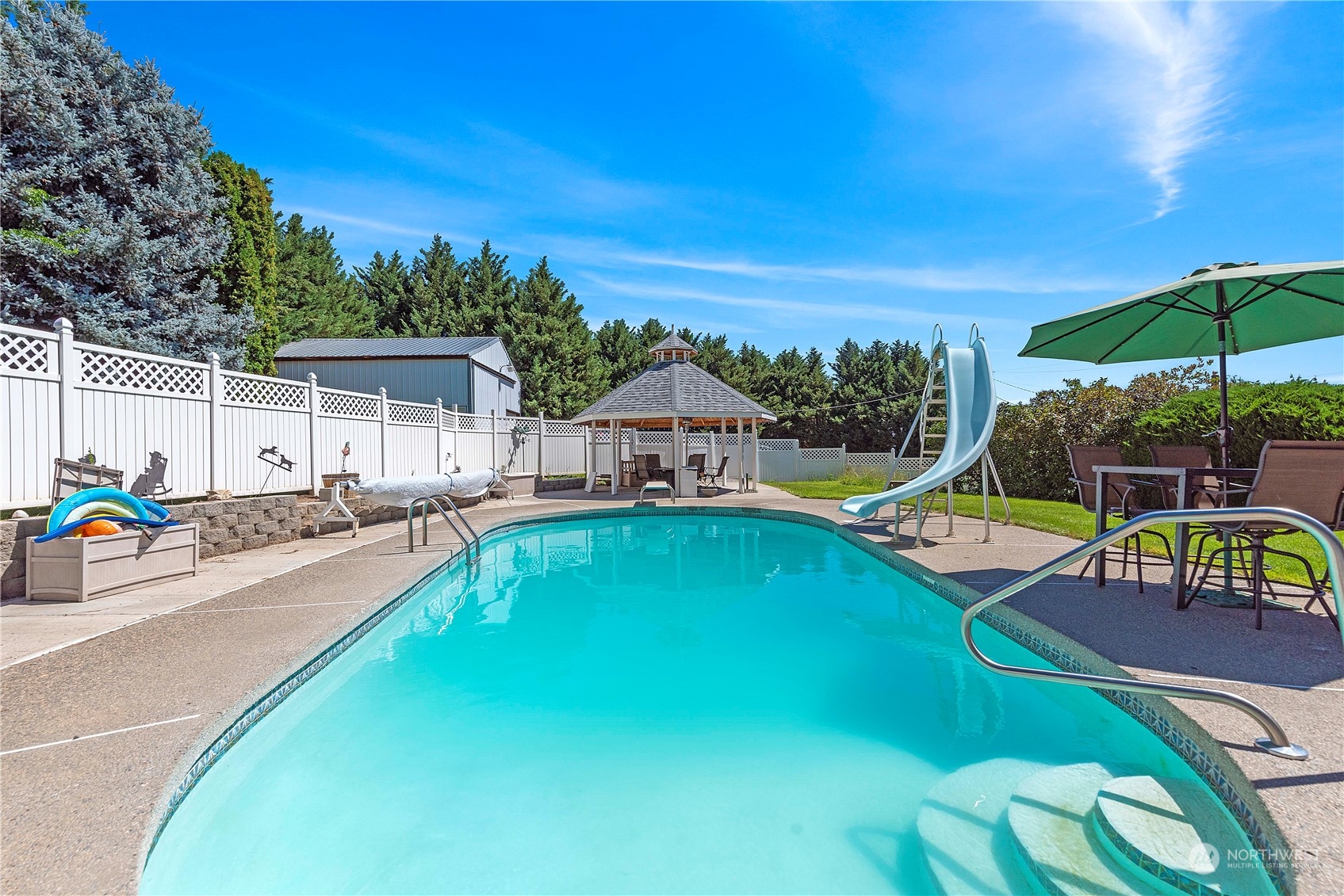 3327 Crestview Road Wenatchee, WA 98801 - Photo 33 of 39 a view of a house with backyard and swimming pool