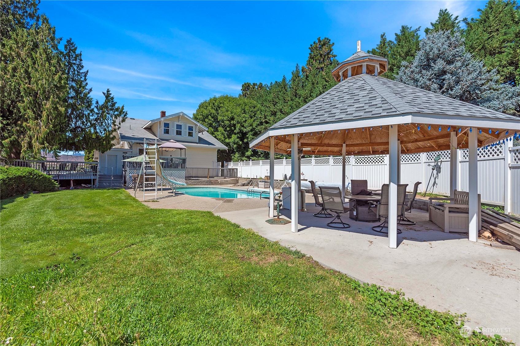 3327 Crestview Road Wenatchee, WA 98801 - Photo 34 of 39 a view of outdoor space yard deck patio and swimming pool