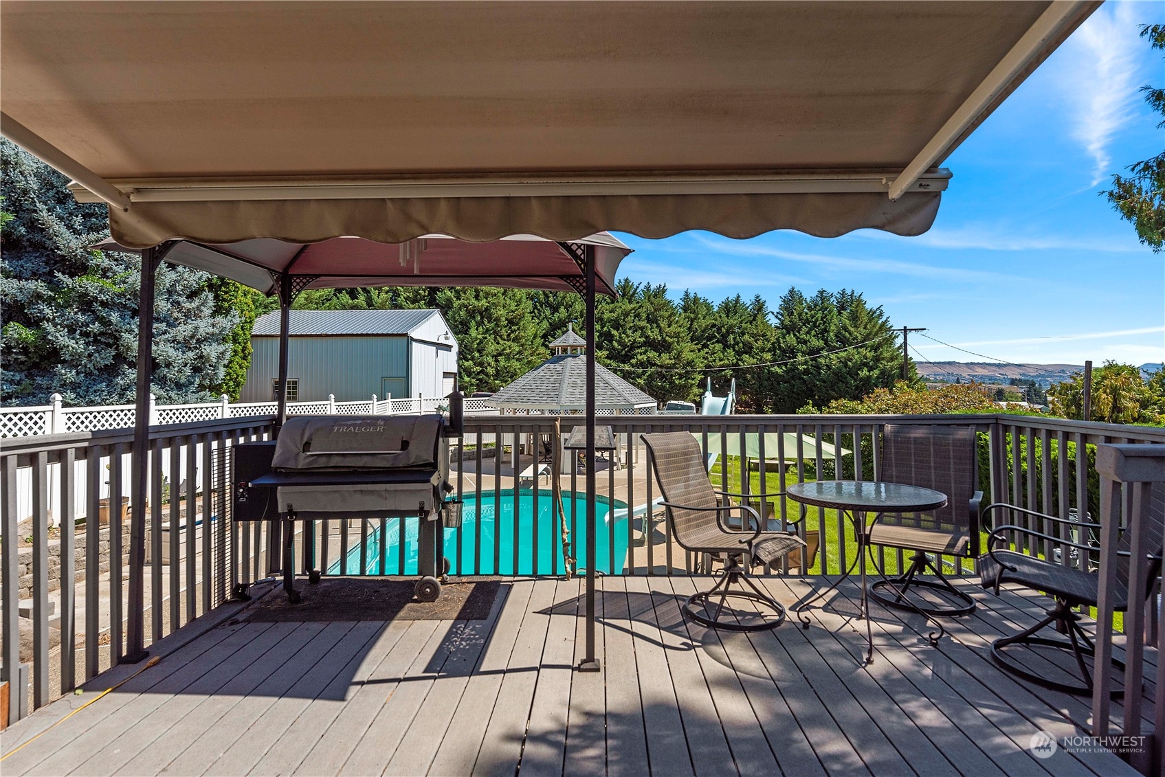 3327 Crestview Road Wenatchee, WA 98801 - Photo 36 of 39 a view of balcony with chairs and wooden floor