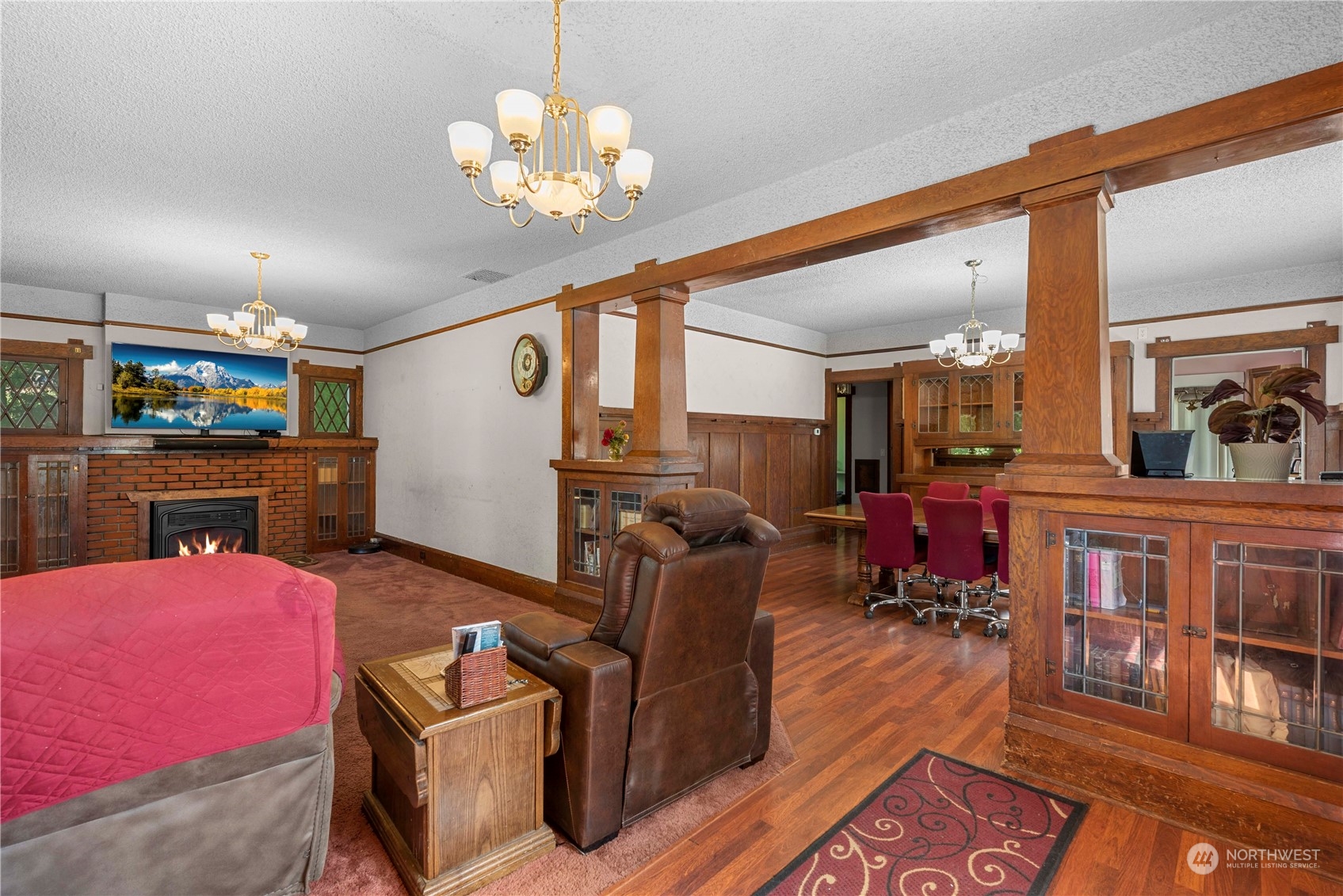 3327 Crestview Road Wenatchee, WA 98801 - Photo 8 of 39 a living room with furniture and a chandelier