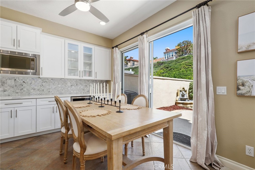 73 Blazewood Lake Forest, CA 92610 - Photo 11 of 53 a view of a dining room with furniture window and outside view