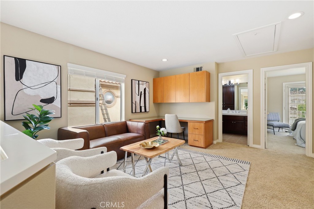 73 Blazewood Lake Forest, CA 92610 - Photo 19 of 53 a living room with furniture and a large window