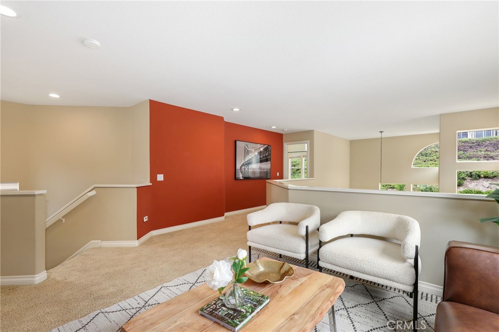 73 Blazewood Lake Forest, CA 92610 - Photo 20 of 53 a living room with furniture and a table