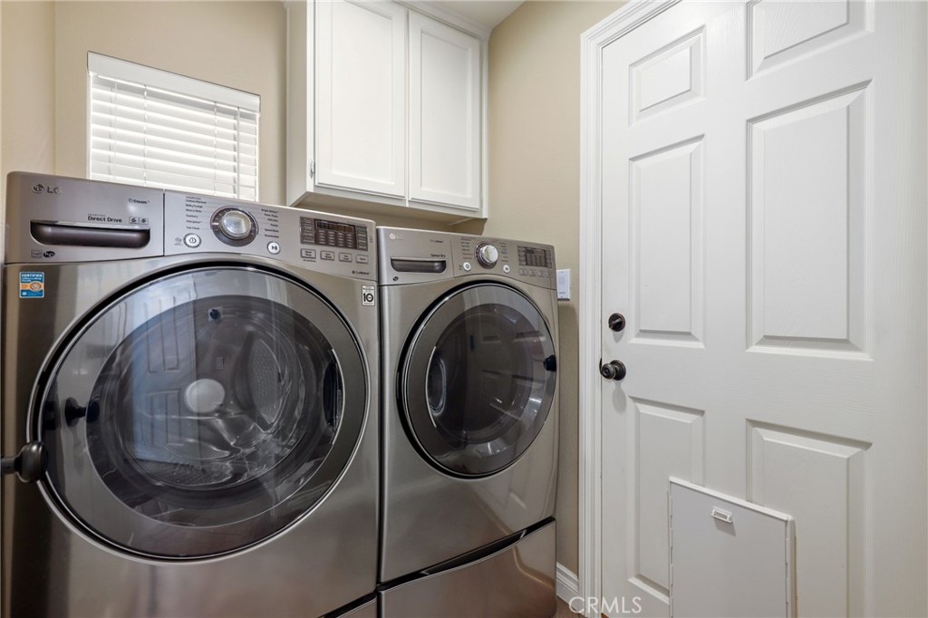 73 Blazewood Lake Forest, CA 92610 - Photo 35 of 53 a utility room with dryer and washer