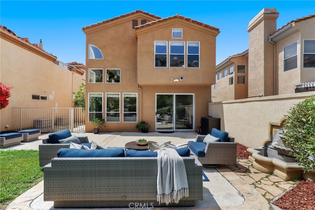 73 Blazewood Lake Forest, CA 92610 - Photo 38 of 53 a view of a house with a patio