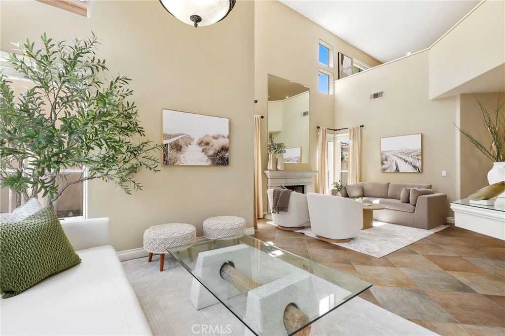 73 Blazewood Lake Forest, CA 92610 - Photo 10 of 53 a living room with furniture and a large window