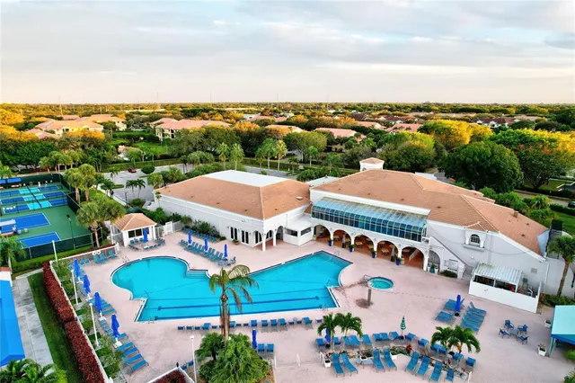 an outdoor space with furniture and city view