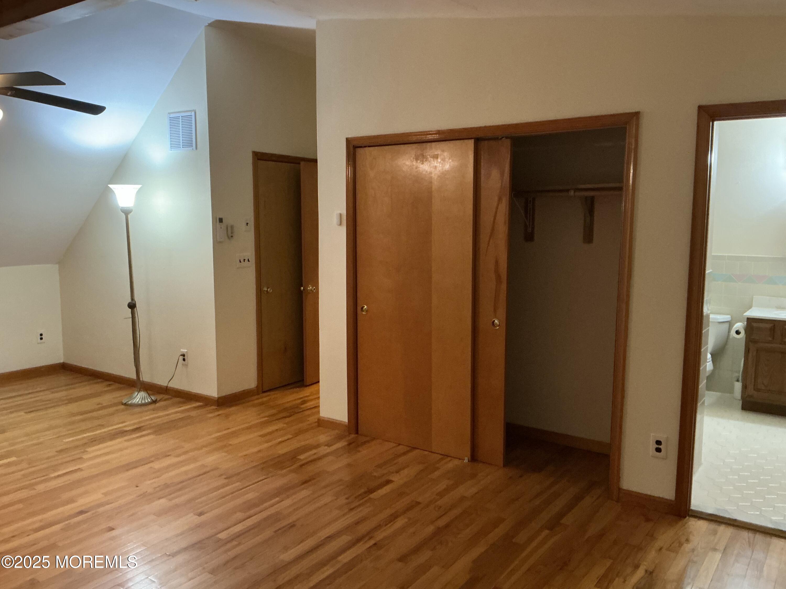 100 Solomon Street Howell, NJ 07731 - Photo 17 of 27 a view of hallway with wooden floor