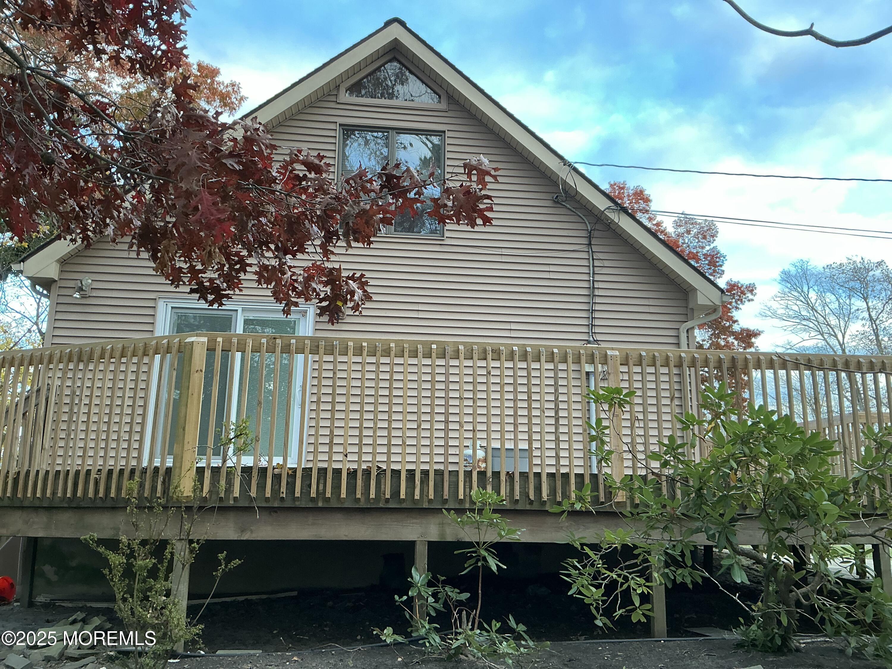 100 Solomon Street Howell, NJ 07731 - Photo 25 of 27 a front view of a house with a garden