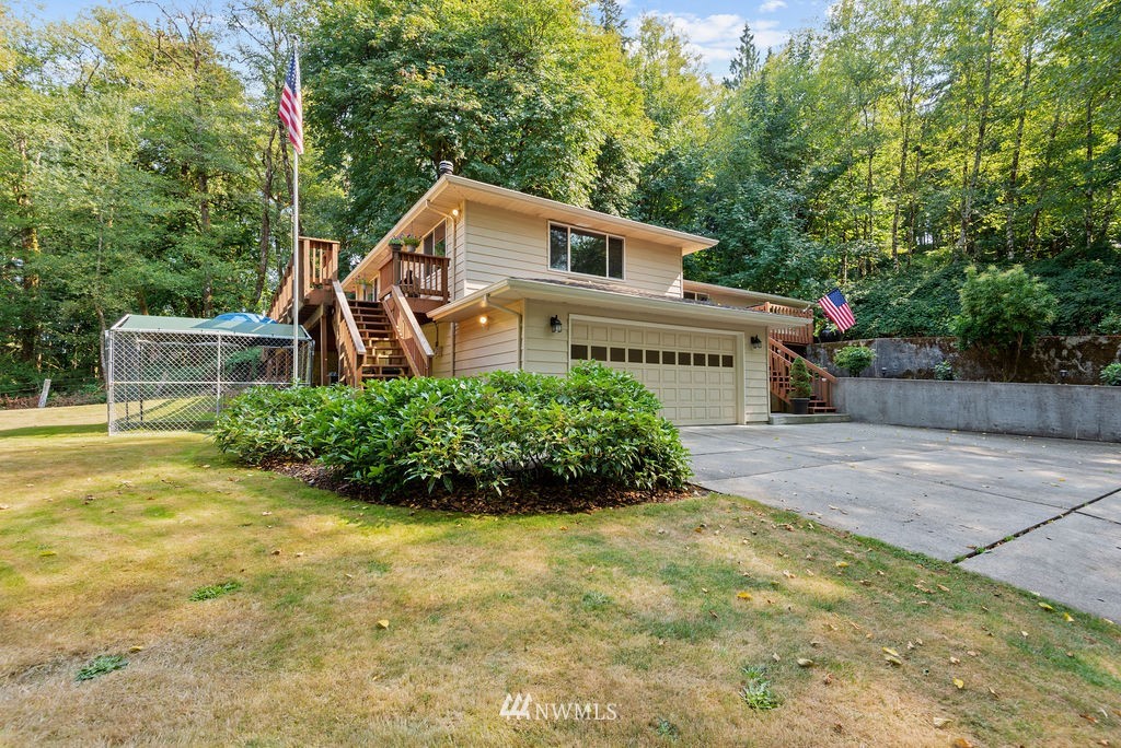 755 Hazel Dell Road Castle Rock, WA 98611 - Photo 25 of 30 a house view with a garden space