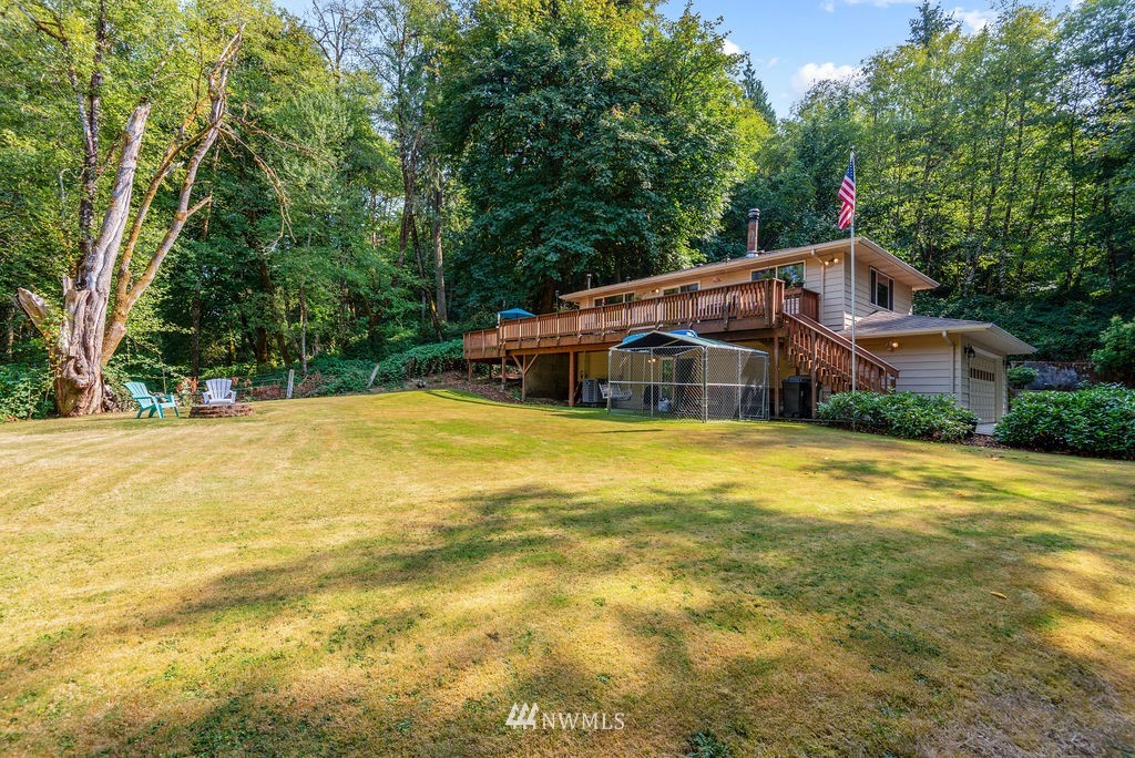 755 Hazel Dell Road Castle Rock, WA 98611 - Photo 26 of 30 a house view with swimming pool in front of it