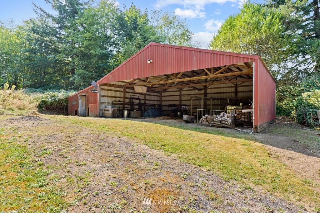 755 Hazel Dell Road Castle Rock, WA 98611 - Photo 29 of 30 a view of a house with a yard