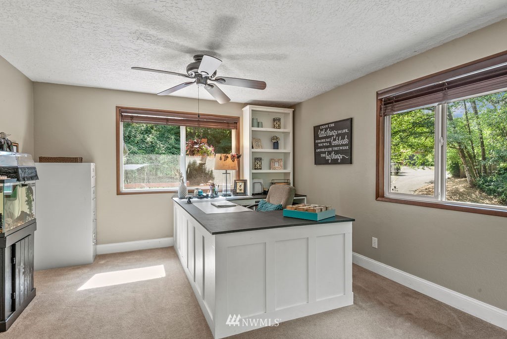 755 Hazel Dell Road Castle Rock, WA 98611 - Photo 9 of 30 a kitchen with a sink stove and refrigerator