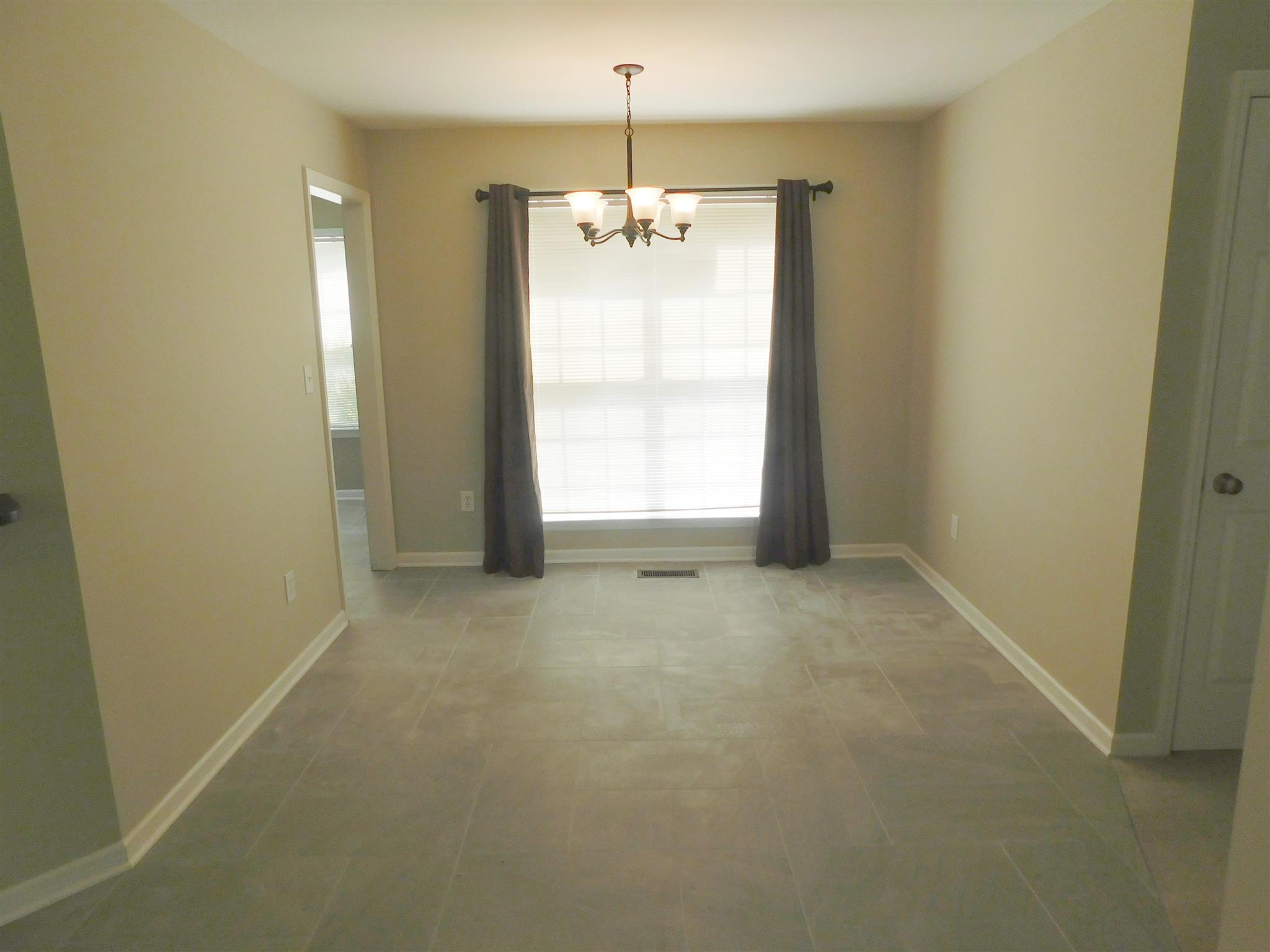 4368 Scott Hollow Road Culleoka, TN 38451 - Photo 6 of 14 Dining area has new tile, new paint and is ready for your family's dinner.