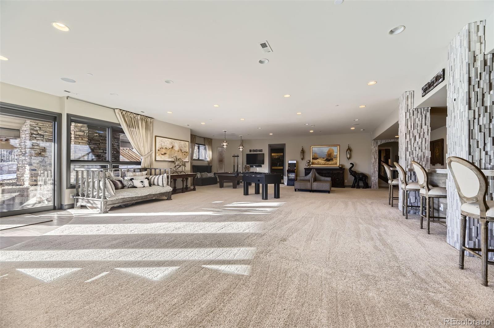 1050 Buffalo Ridge Road Castle Pines, CO 80108 - Photo 41 of 50 a view of a room with gym equipment