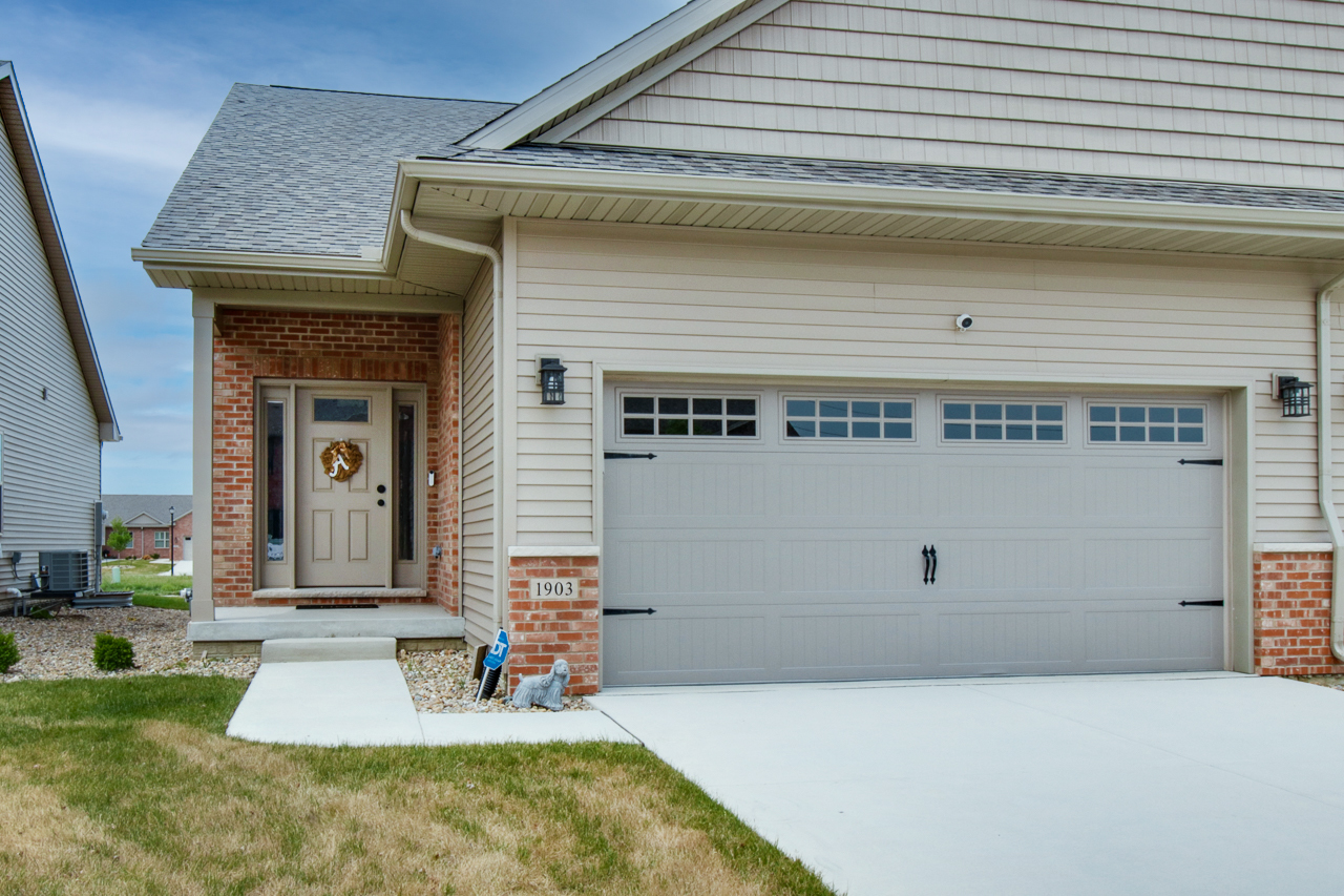 1903 Glenbridge Road Bloomington, IL 61704 - Photo 1 of 33 a front view of a house with a yard