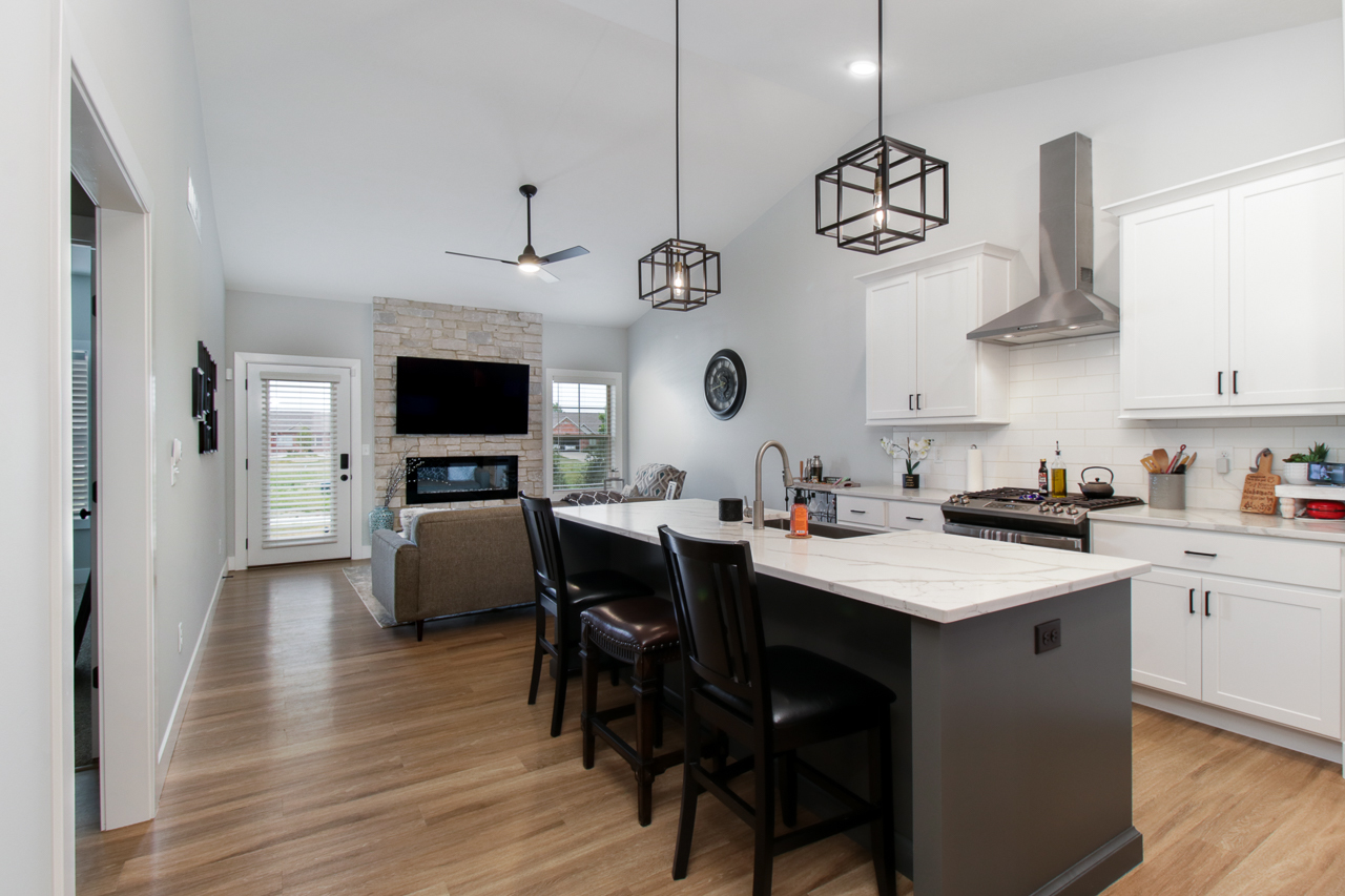 1903 Glenbridge Road Bloomington, IL 61704 - Photo 12 of 33 a kitchen with a dining table and chairs