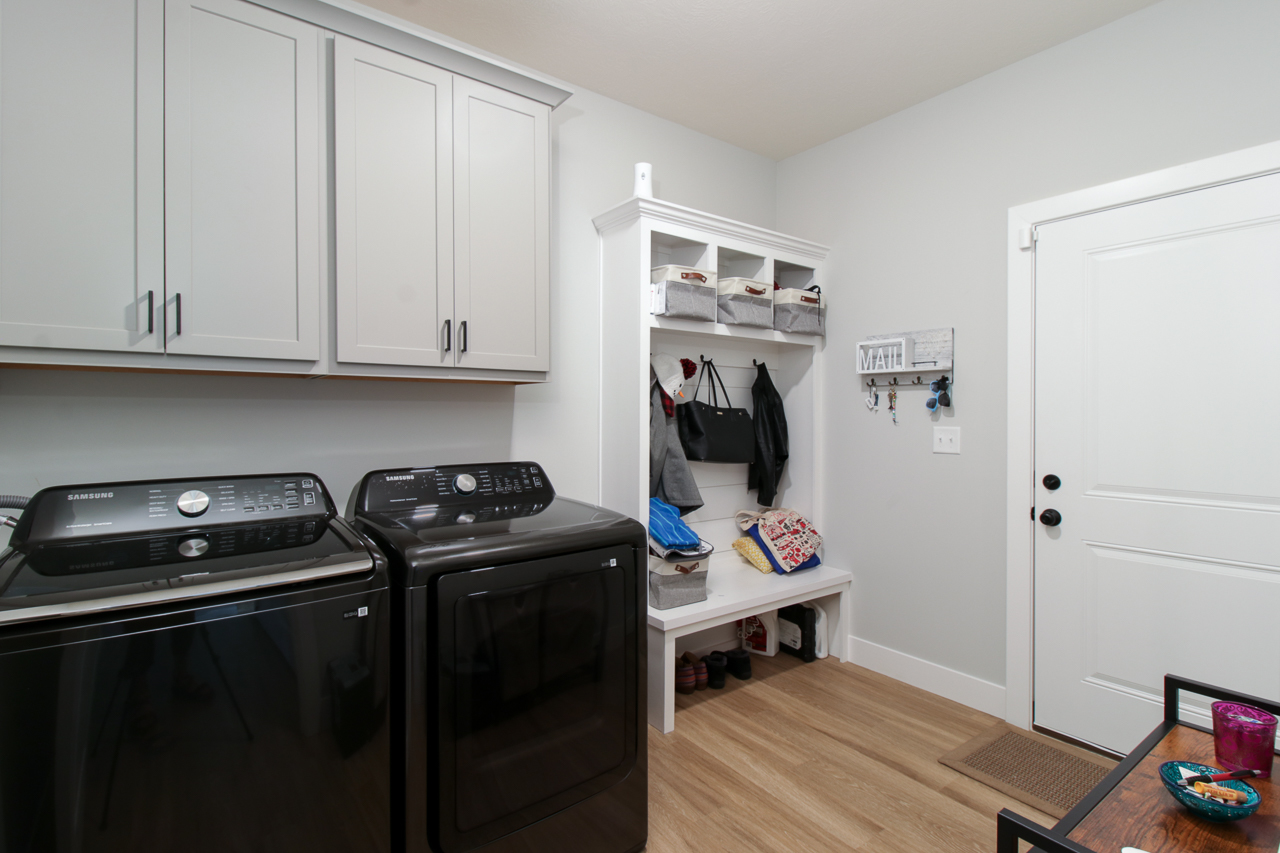 1903 Glenbridge Road Bloomington, IL 61704 - Photo 14 of 33 a view of a storage and utility room with washer and dryer