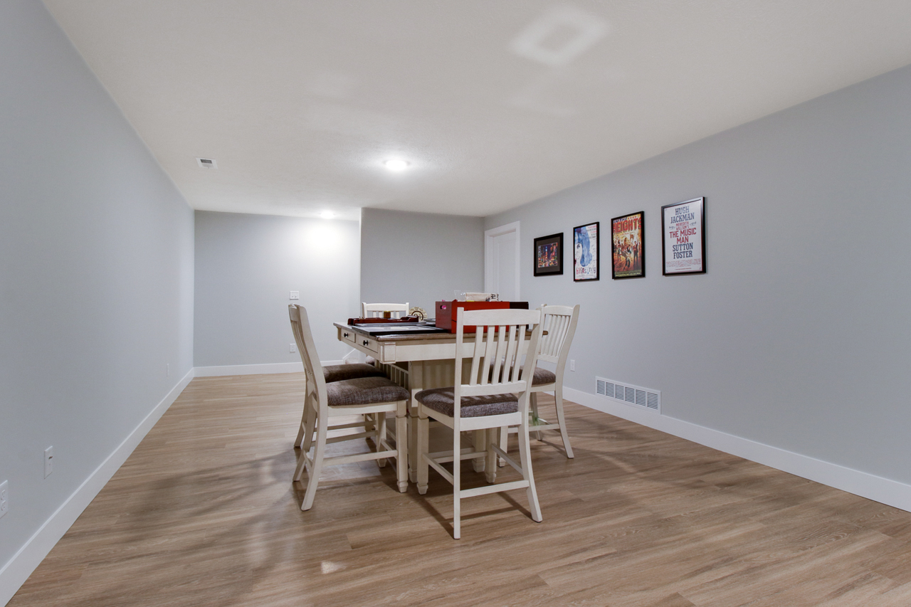 1903 Glenbridge Road Bloomington, IL 61704 - Photo 20 of 33 a dining room with furniture and wooden floor