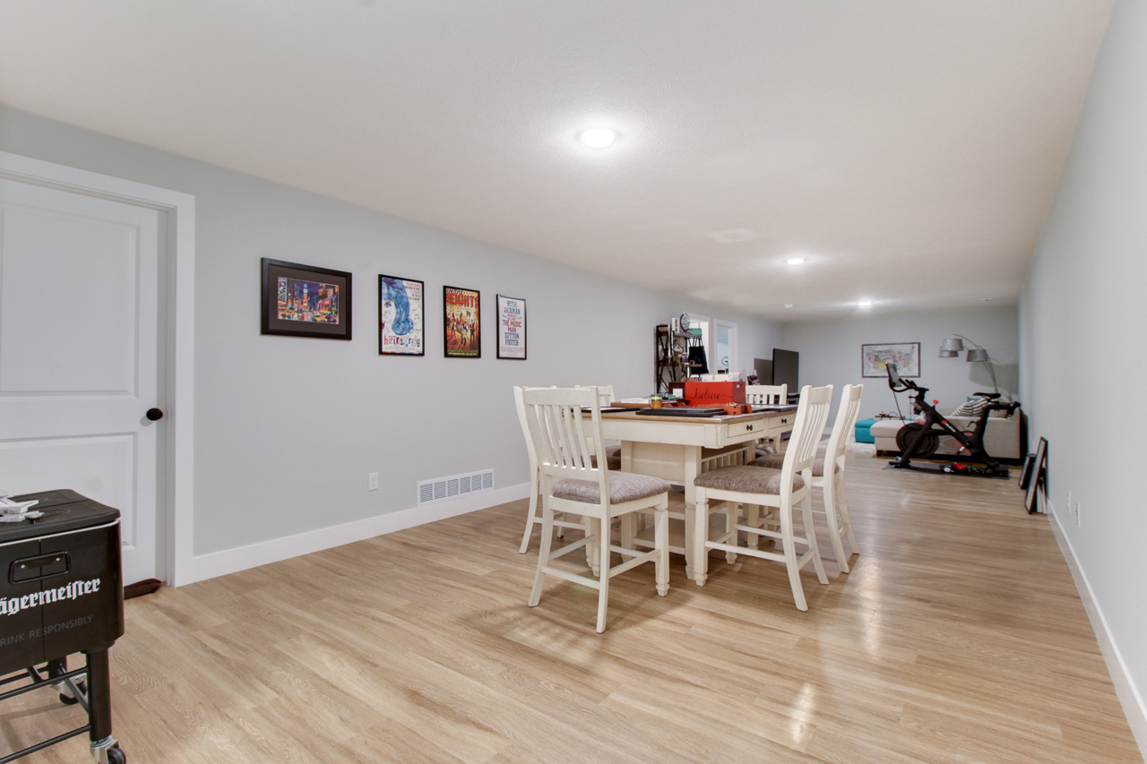 1903 Glenbridge Road Bloomington, IL 61704 - Photo 22 of 33 a dining room with furniture and wooden floor