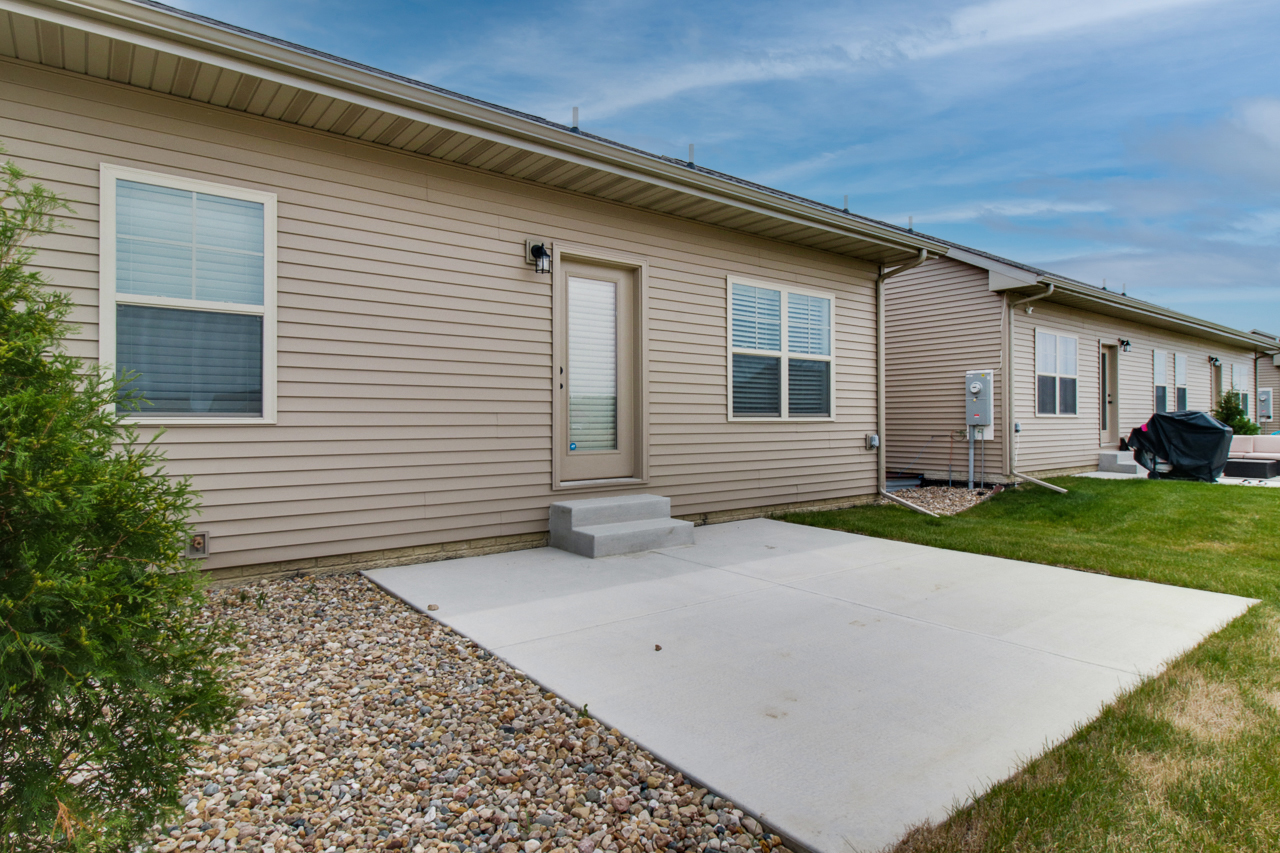 1903 Glenbridge Road Bloomington, IL 61704 - Photo 27 of 33 a view of a house with a backyard