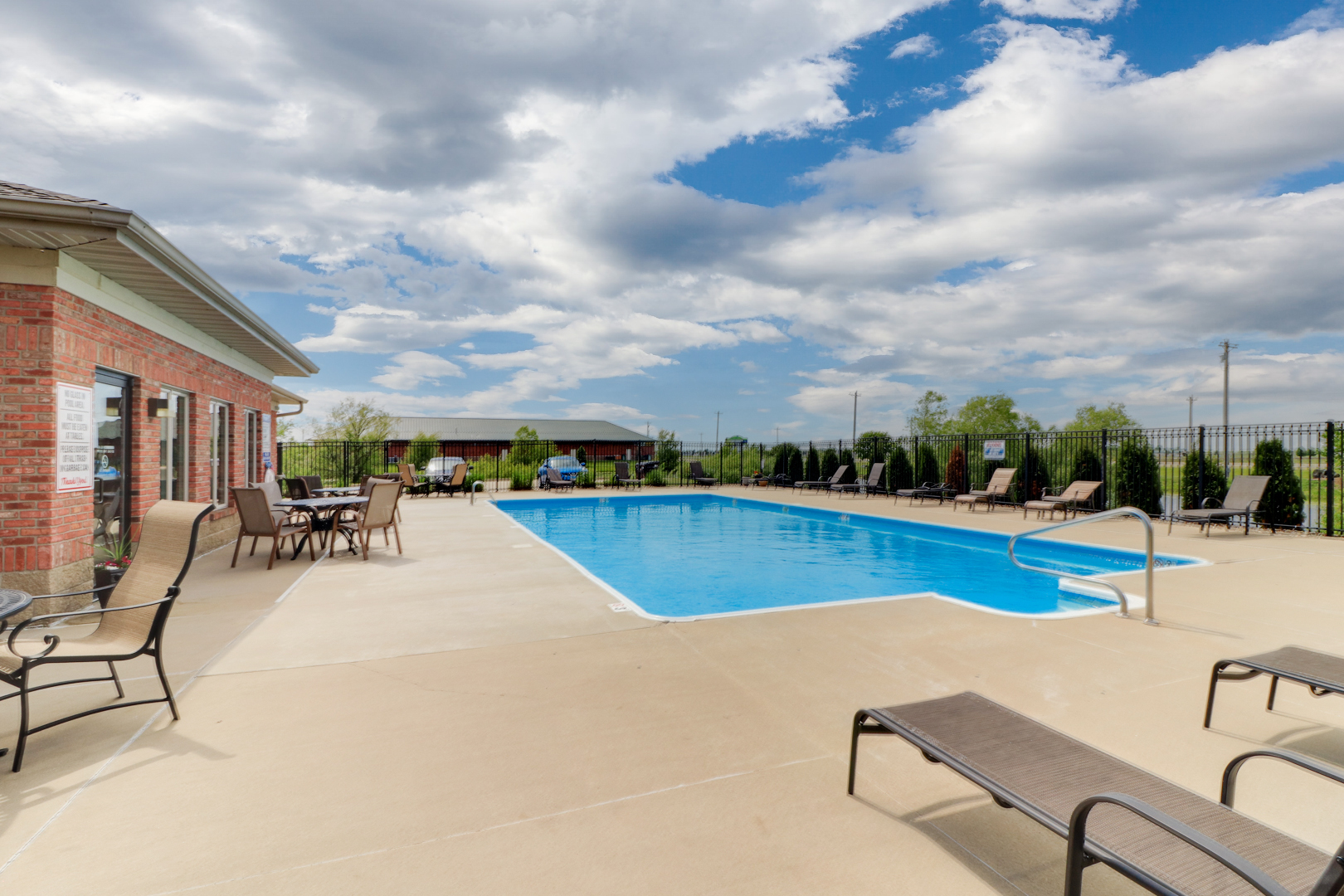1903 Glenbridge Road Bloomington, IL 61704 - Photo 31 of 33 a view of a swimming pool with a lounge chair